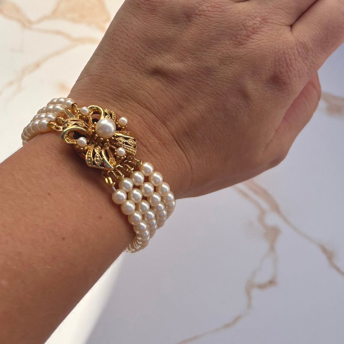 4-Strand Faux Pearl & Gold-Toned Bow Bracelet