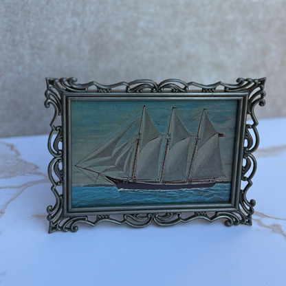 Ornate Silver-Toned Picture Frame with Post Card